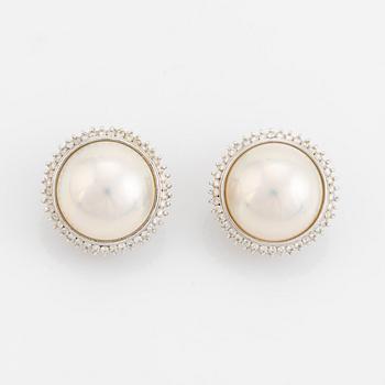 Mabe pearl and brilliant cut diamond earrings.
