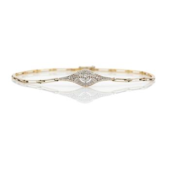 Bracelet, 18K gold with a centre piece set with diamonds.