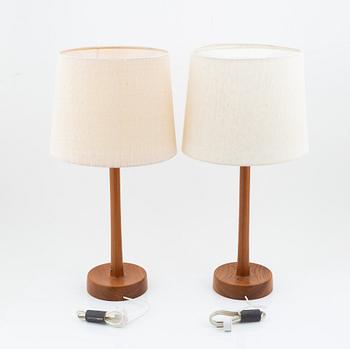 Uno & Östen Kristiansson, a pair of teak table lamps, Luxus, Sweden.