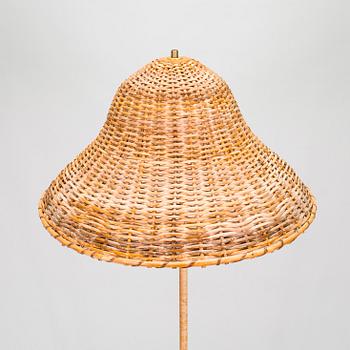A mid-20th century floor lamp.