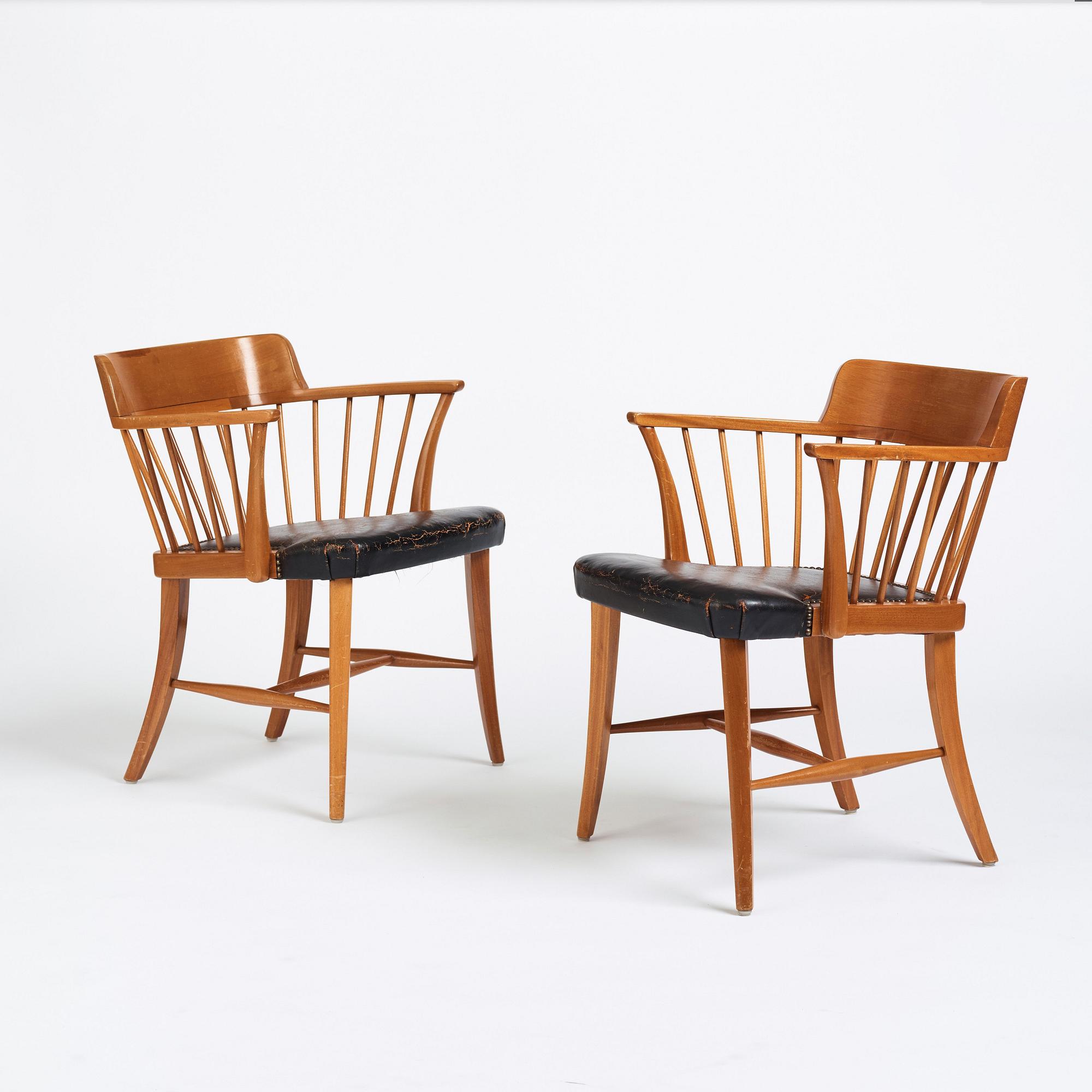 Josef Frank, a pair of mahogany and black leather 'Captain's chair', Svenskt Tenn, model 789B, acquired in 1950.
