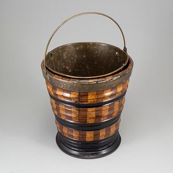 A 19th century brass and wood wine cooler.