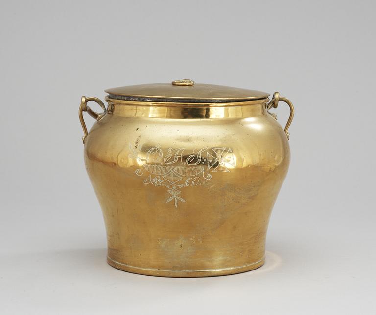 A Skultuna brass pot with cover, dated 1860.