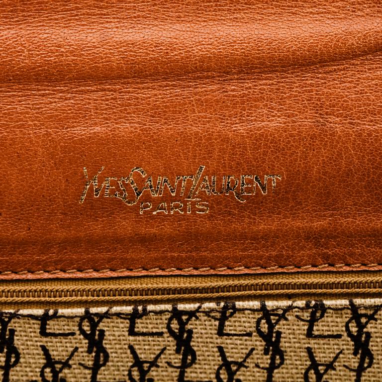 A brown leather clutch from Yves Saint Laurent.