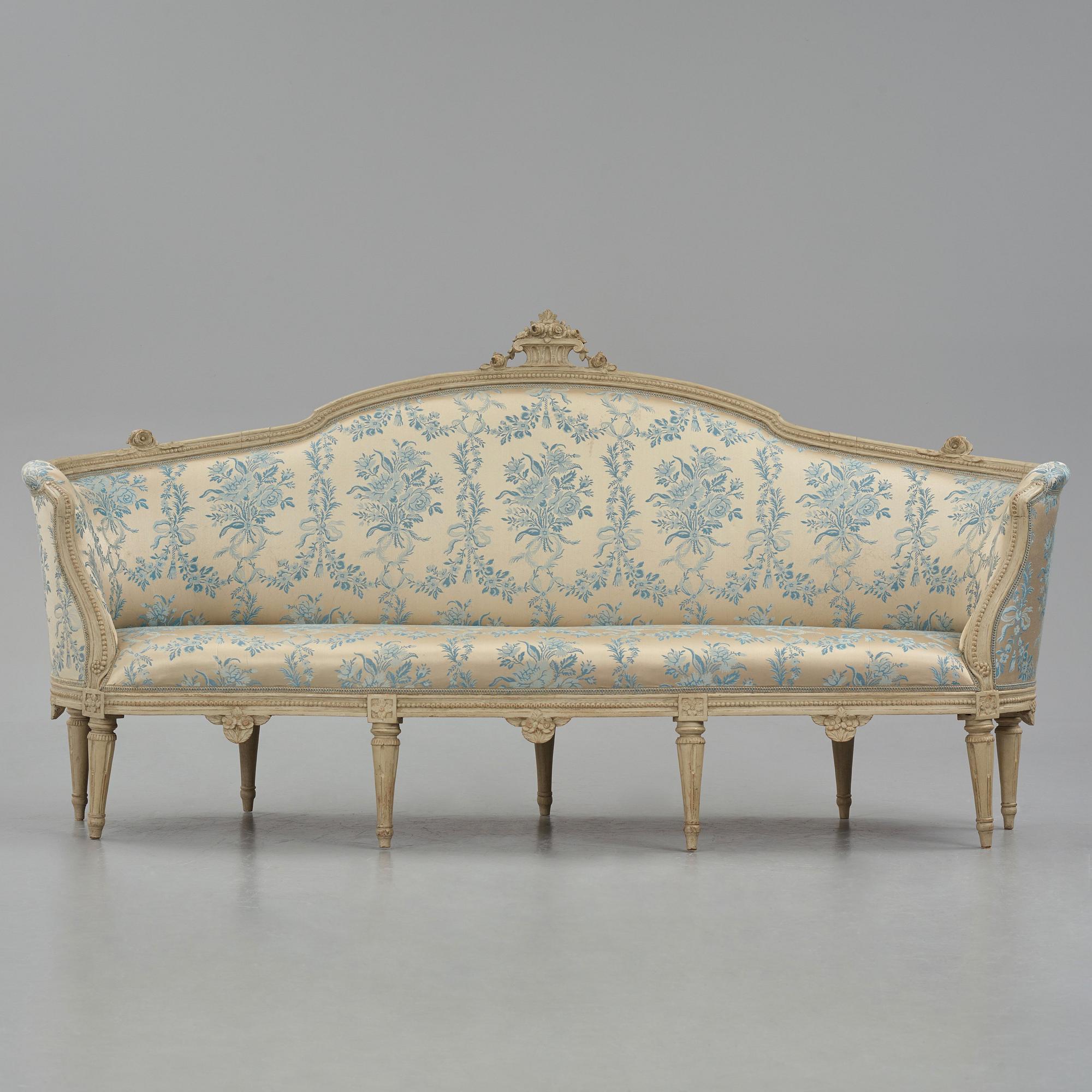 A grey-painted Gustavian 'canapé en corbeille'. sofa, by J E Höglander.