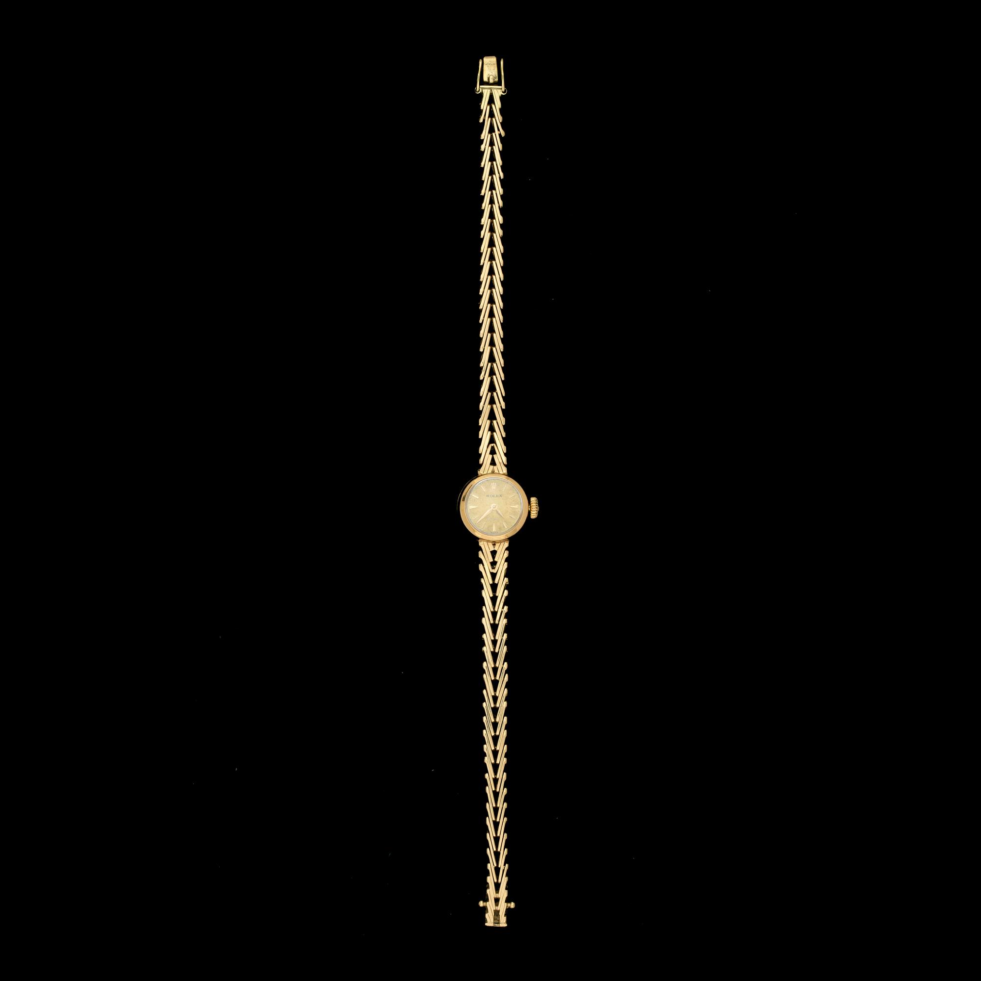 DAMARMBANDSUR, Rolex, Orchid 18k med integrerad länk 14k guld. 1900-talets andra hälft. Tot vikt 19,3g.