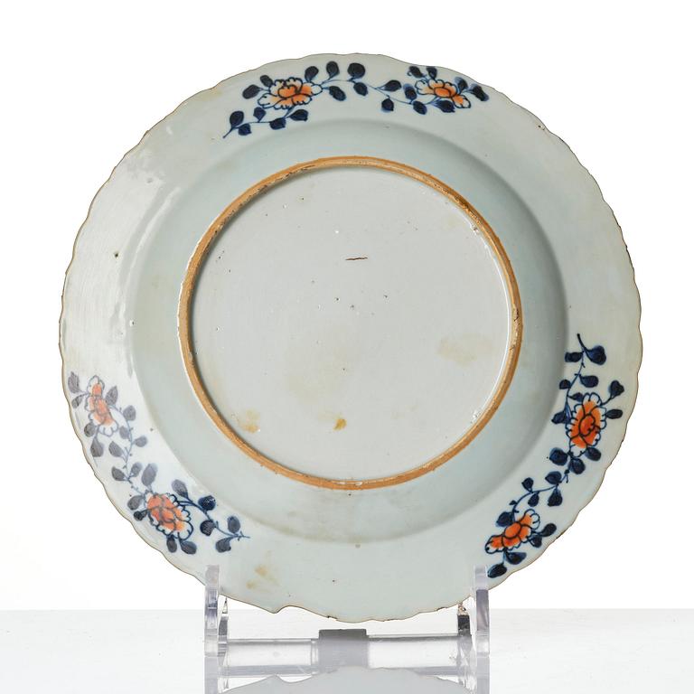 A set of three famille rose 'tobacco leaf' plates, Qing dynasty, Qianlong (1736-95).