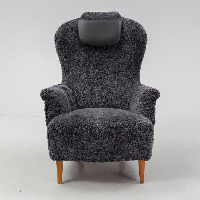 Carl Malmsten, a shearling upholstered 'Farmor' lounge chair from Oh Sjögren.
