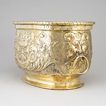 An 18th century brass champagne cooler.