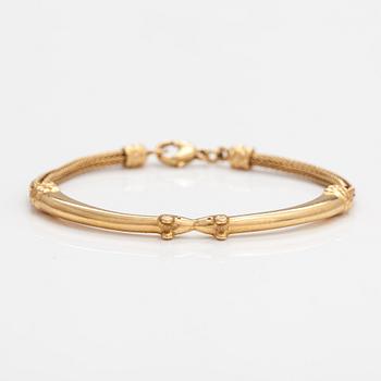 An 18K gold bracelet "Moose head". Kalevala Koru, Helsinki 1999.