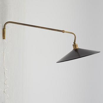 A 20th century brass and painted metal swing-arm wall light.