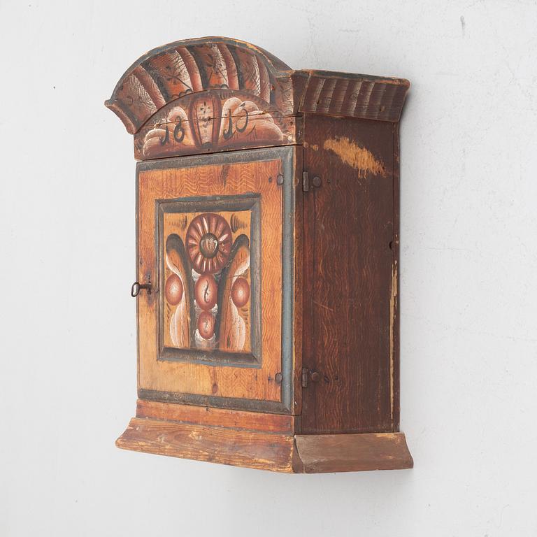 A Swedish wall cabinet, Rättvik, Dalarna, dated 1815.