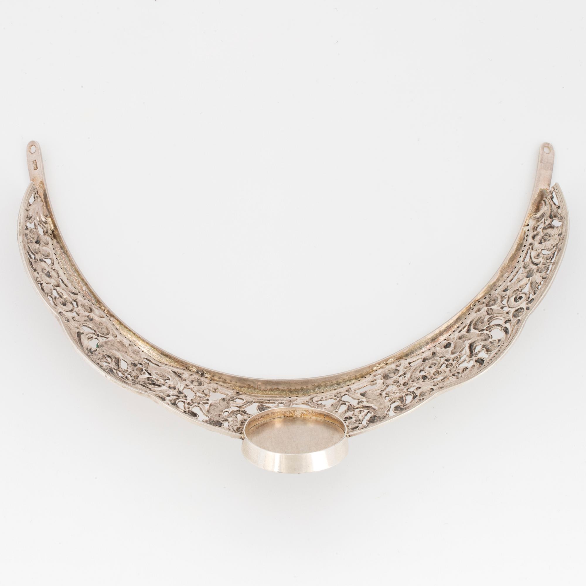 A silver and miniatyre portrait on porcelain tiara.