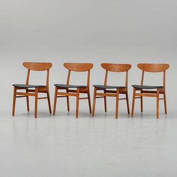A teak dining table with 4 'Monaco' chairs, mid 20th century.