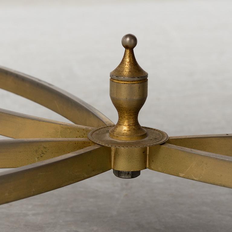 a metal and onyx coffee table from the mid 20th century.