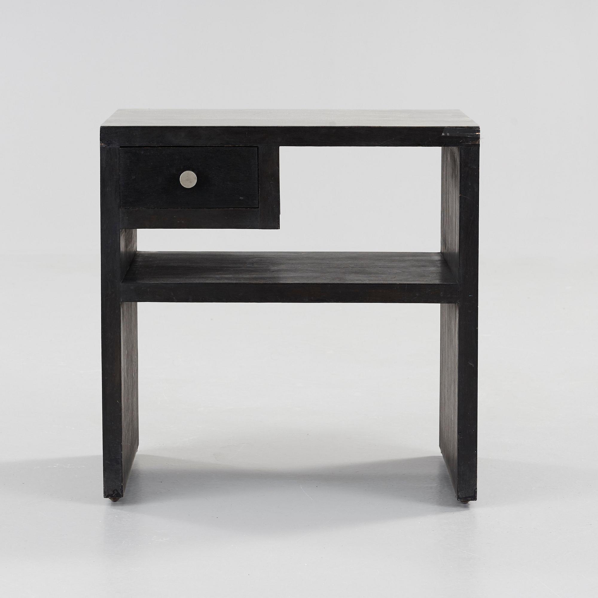 An Uno Åhrén black lacquered birch and pewter side table, Svenskt Tenn, Stockholm ca 1930.