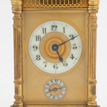 A brass carriage clock, Duverdrey & Bloquel, France, around the year 1900.