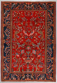 AN OLD/SEMI ANTIQUE ARAN RUG, 194 x 130 cm.