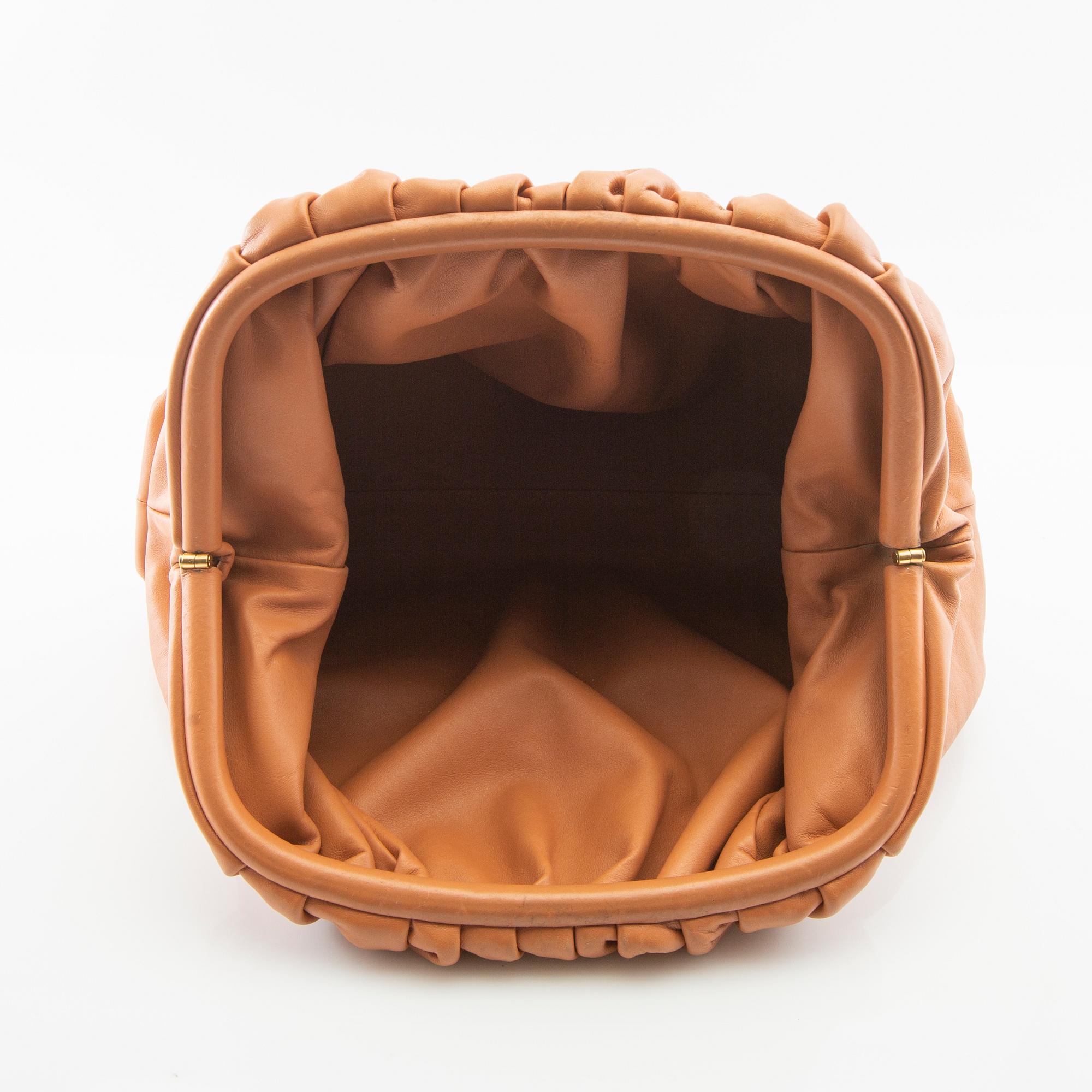 Bottega Veneta, "Pouch Clutch".