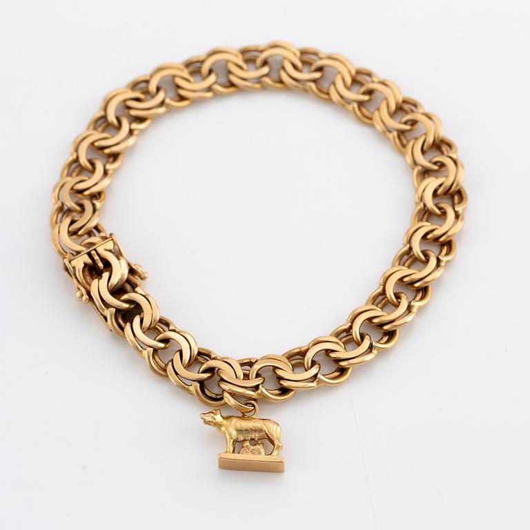 Armband med berlock 18K guld.