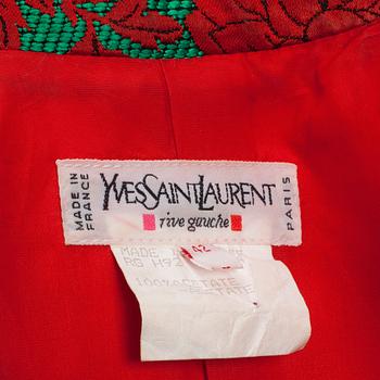 YVES SAINT LAURENT, a two-piece suit consisting of jacket and skirt.