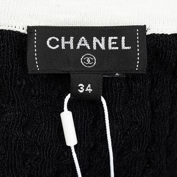 Chanel, A cotton halterneck top, size 34.
