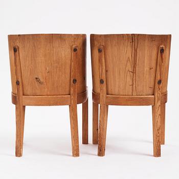 Axel Einar Hjorth, a pair of "Lovö" stained pine armchairs, Nordiska Kompaniet 1930s.