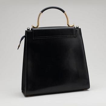 KARL LAGERFELD, a dark blue leather top handle bag.