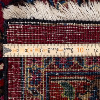 A Meshed carpet, c. 393 x 305 cm.