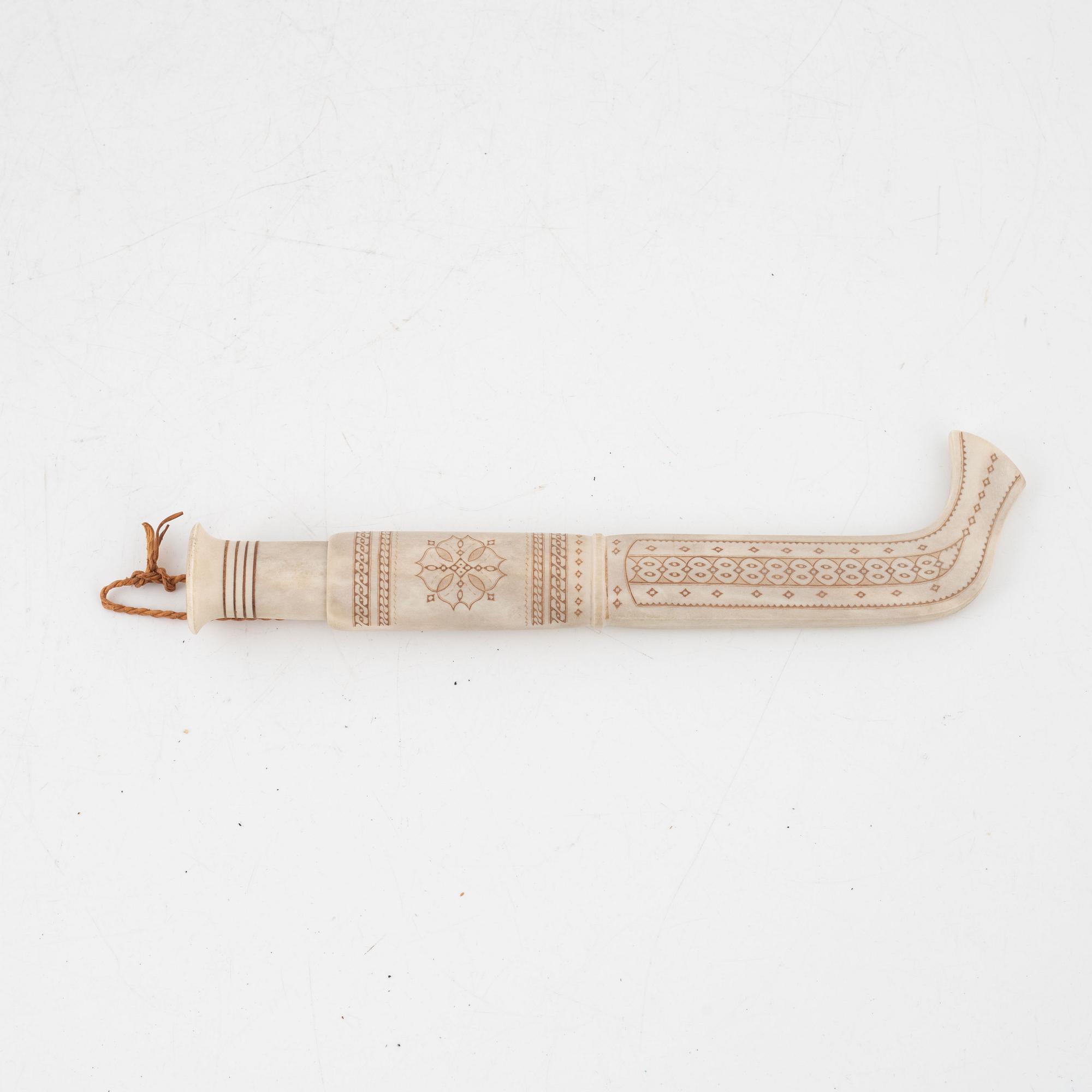 Thore Sunna, a reindeer horn knife, signed.