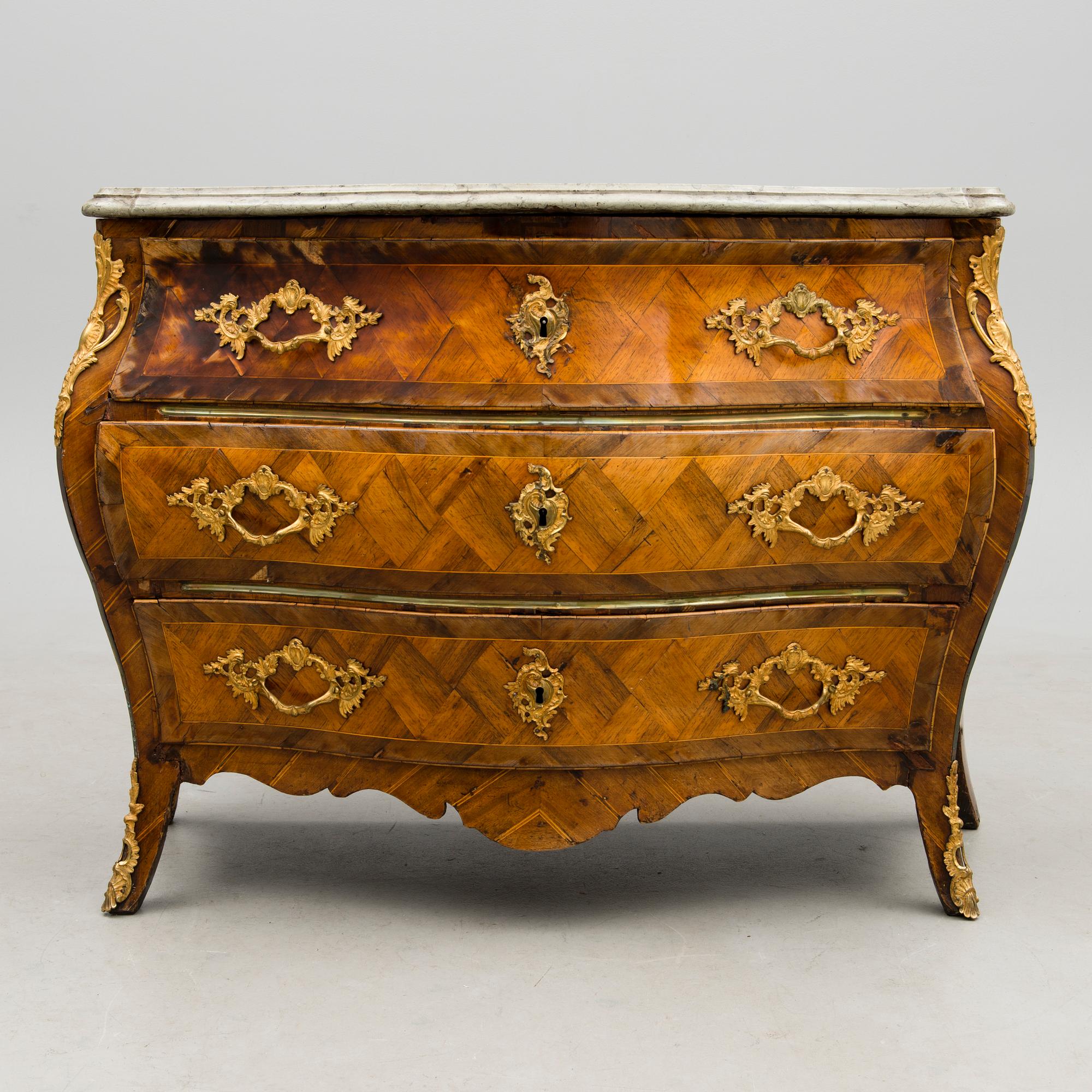 A Swedish Rococo 18th century commode by G. Foltiern.