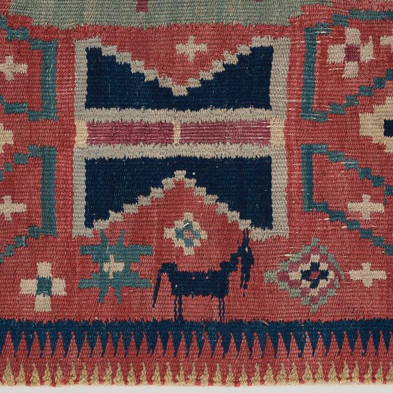 A CARRIAGE CUSHION, "Träd och timglas", double interlocked tapestry, ca 101,5 x 50,5 cm, Scania, Sweden,