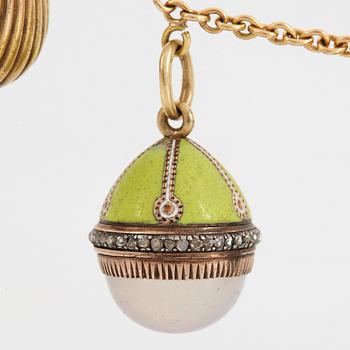 A FABERGÉ  GOLD Chain Necklace WITH 8 GOLD, ENAMEL ETC MINIATURE EASTER EGG PENDANTS, S.T PETERSBURG and 3 other.