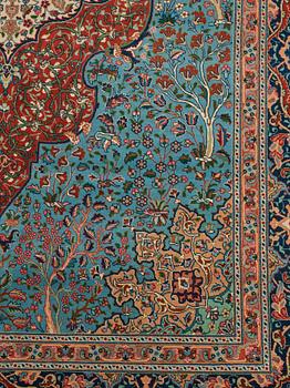 A carpet, an old Tabriz, ca 263,5-266 x 165,5-169,5 cm (as well as 1-1,5 cm blue and terracotta striped flat wear).