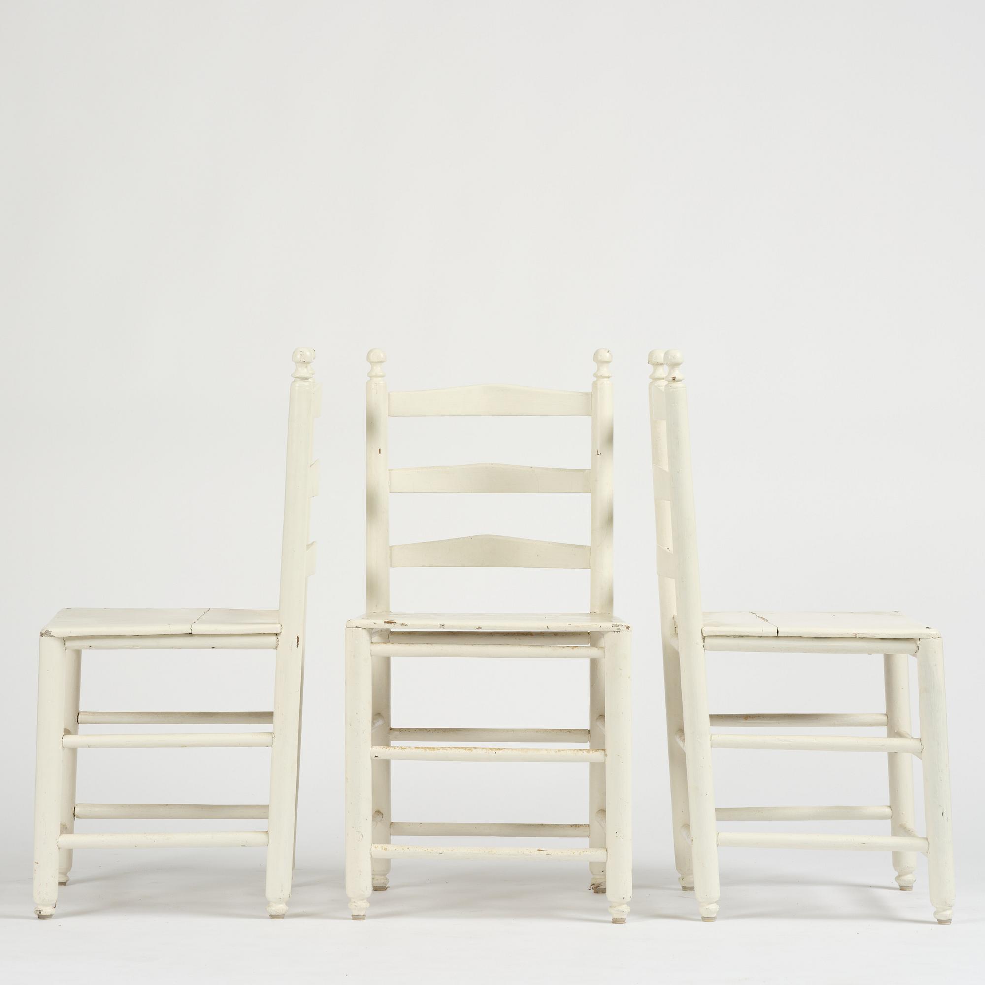 A set of three Gustavian ladderback chairs, late 18th/ early 19th century.