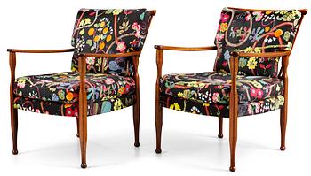 A pair of Josef Frank mahogany armchairs, Svenskt Tenn, model 891.