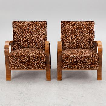 A pair of armchairs, mid-20th Century.