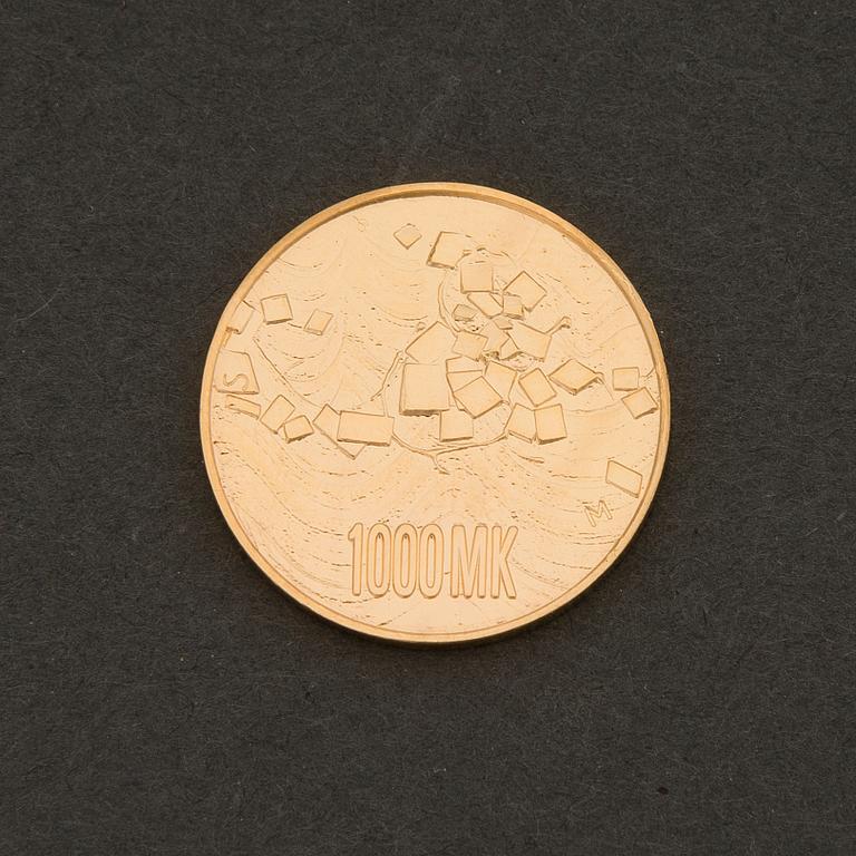 A Finnish gold .900 commemorative coin, 1000 mk, Finland 75 years.