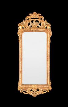 1569. A Swedish Rococo 18th century mirror by J Åkerblad, master 1758.