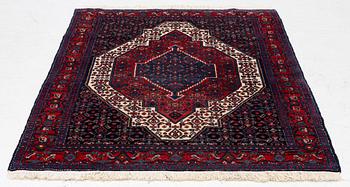 A Senneh rug, c. 160 x 117 cm.