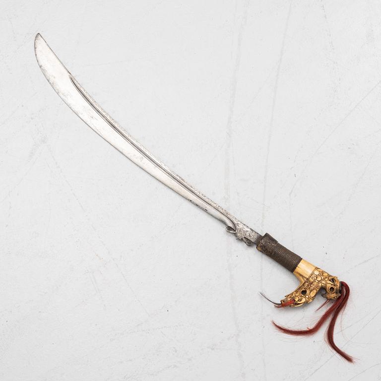 A curved Mandau-sword, possible 19th Century.