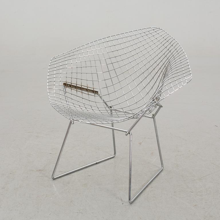 A HARRY BERTOIA "DIAMOND CHAIR".