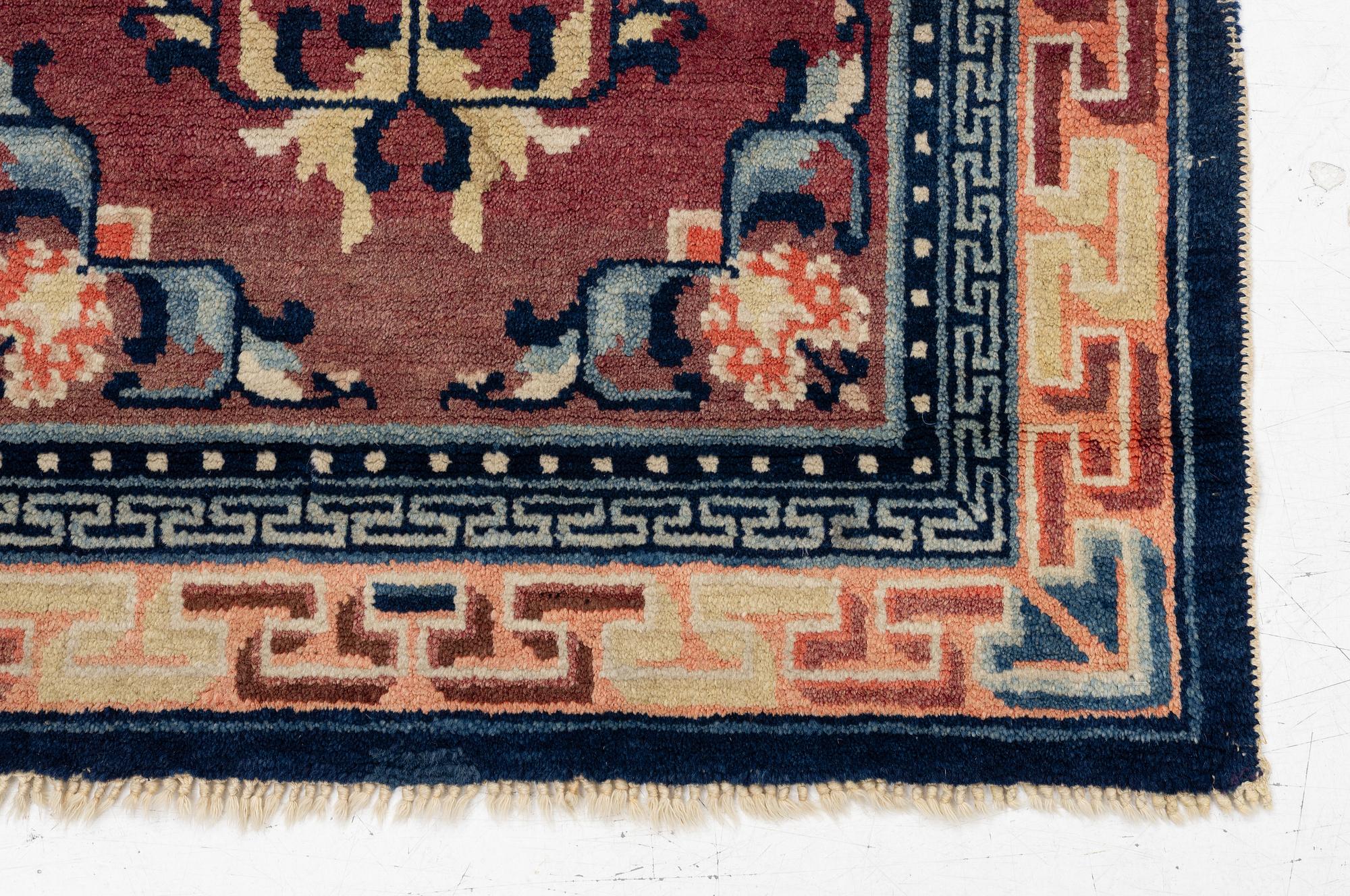 Carpet, antique China, approx. 128 x 67 cm.