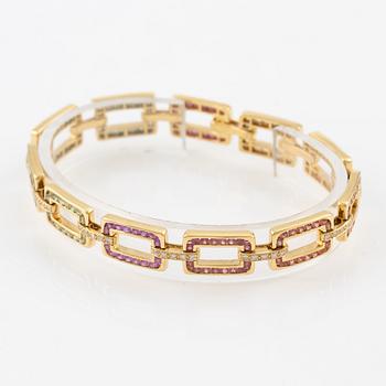 Bracelet 18K gold with sapphires in various colours and round brilliant-cut diamonds.