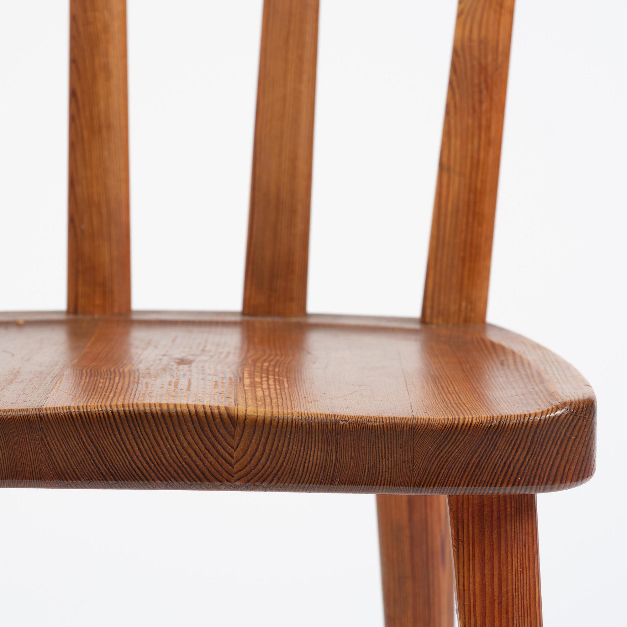 Axel Einar Hjorth, a set of six stained pine "Utö" chairs, Nordiska Kompaniet, Sweden, 1930s.