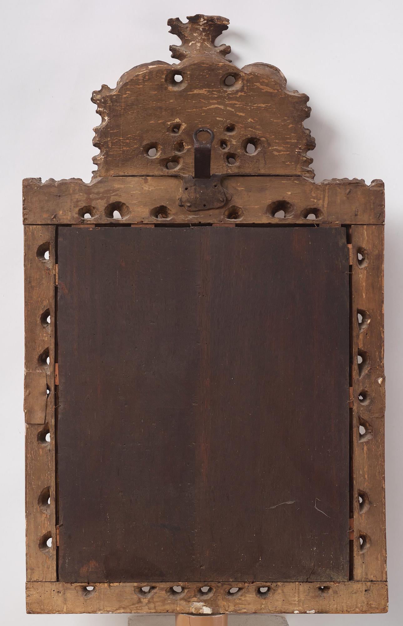 A baroque carved giltwood frame / mirror, circa 1700.