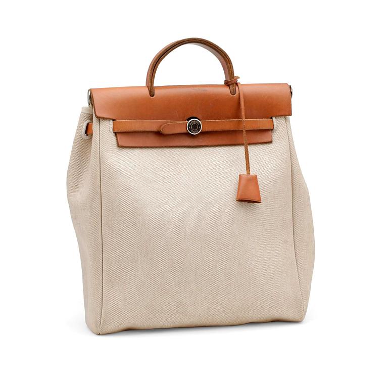 HERMÈS, a canvas and leather bag in two parts, "Herbag".