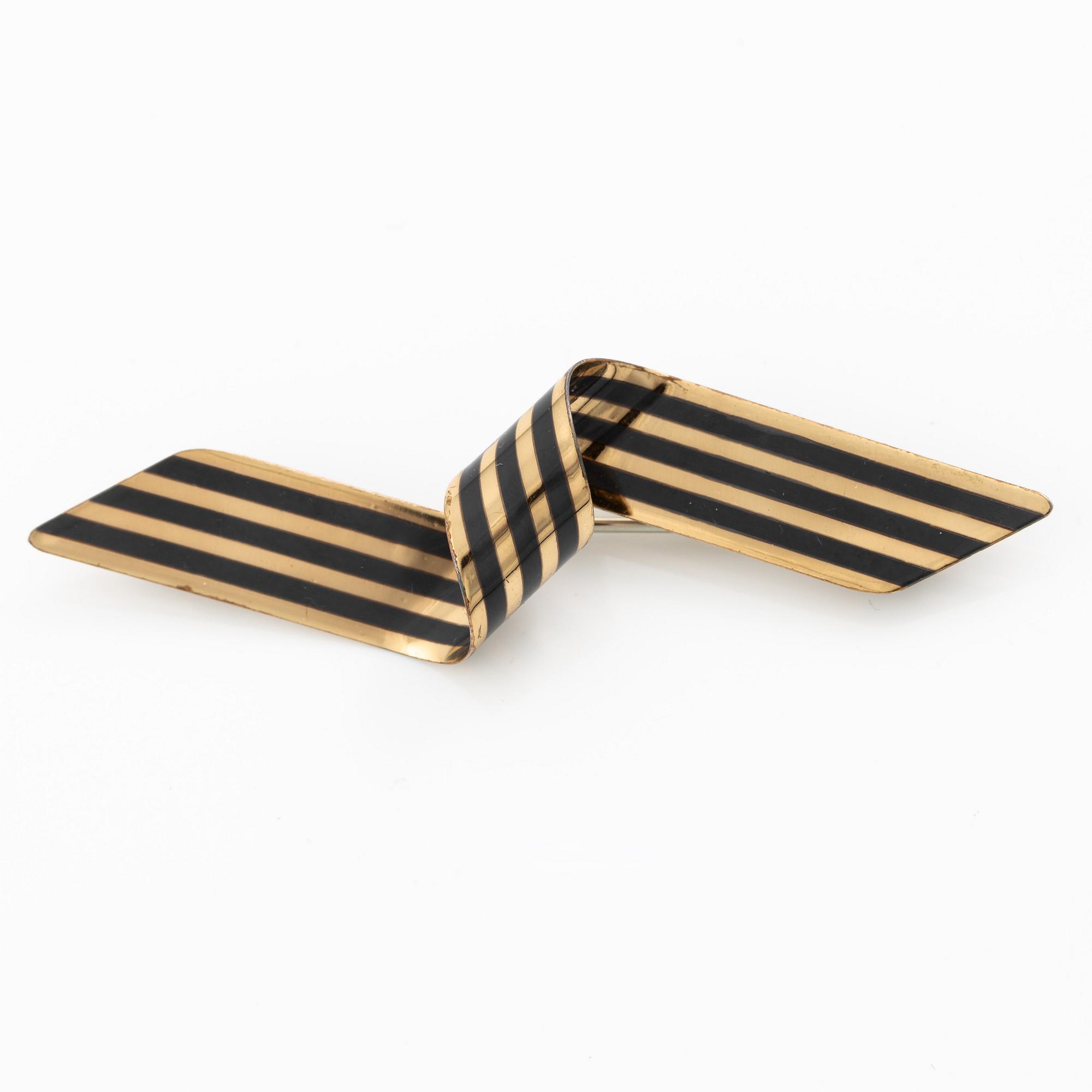 Brooch and a pair of earrings 14K gold and silver, Morelli.