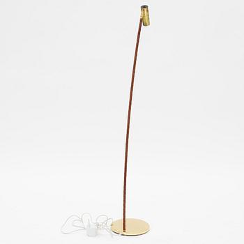 A brass floor lamp from Örsjö.