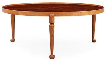 A Josef Frank burrwood and walnut sofa table by Svenskt Tenn, model 2139.